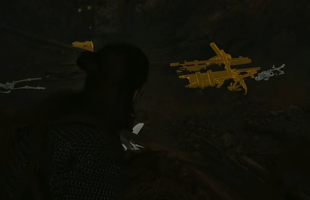 Focus highlights a wrecked wagon in gold beside white skeletons. No loot list or Durandal item name is visible in this frame.
