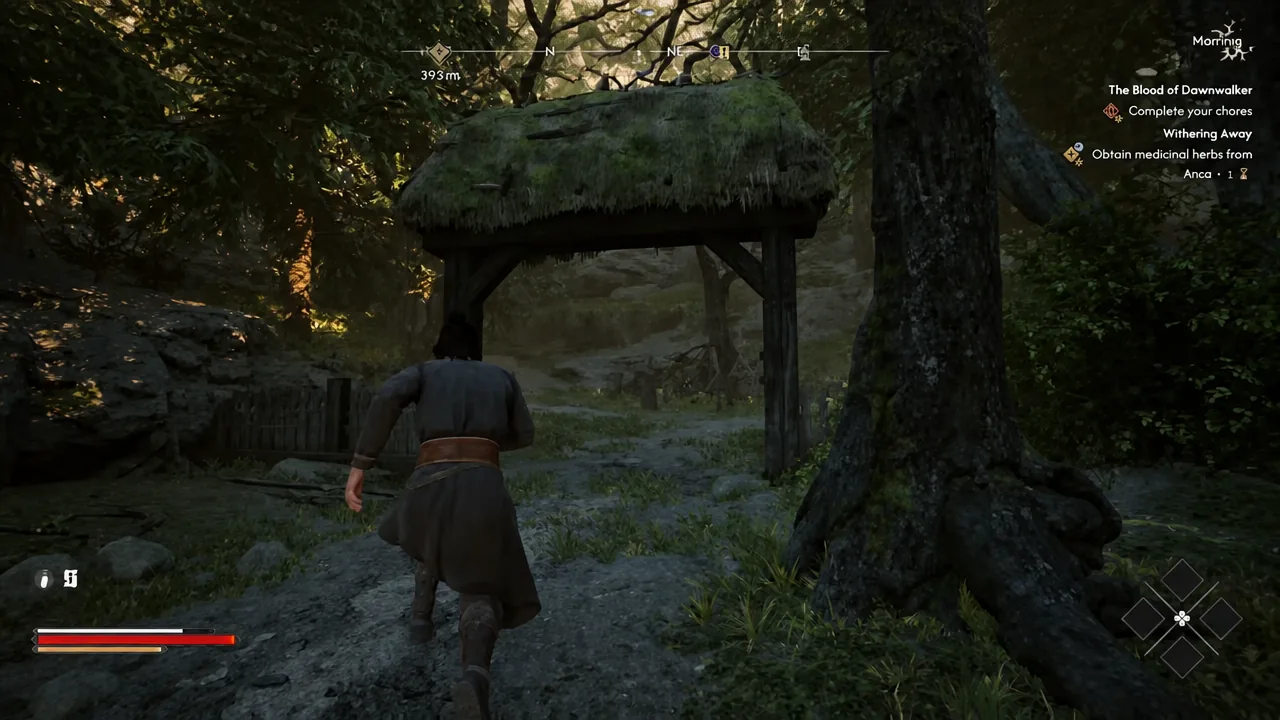 Wooden archway on the burial-ground route.